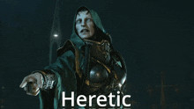 a man in a green robe is pointing with the words heretic below him