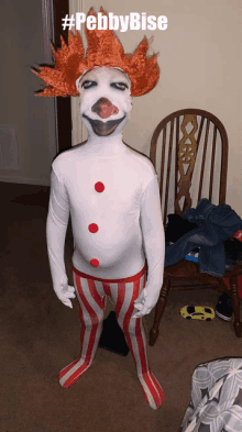 a person dressed as a clown with the hashtag pebblybise