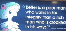 a sign that says better is a poor man who walks in his integrity