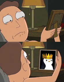 a cartoon of a man looking at a picture of a penguin with a crown on it