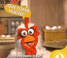 a cartoon chicken says que coma huevo