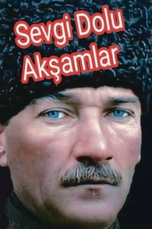 a close up of a man 's face with the words " sevgi dolu aksamlar " written on it