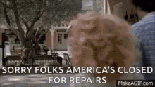 a man is standing in front of a tree with the words `` sorry folks america 's closed for repairs ''