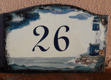 a sign with the number 26 painted on it