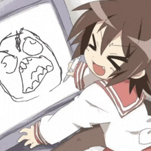 a girl is sitting in front of a computer screen drawing a rage face .