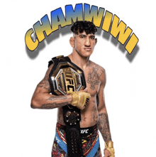 a man holding a ufc belt stands in front of the word chamwinni