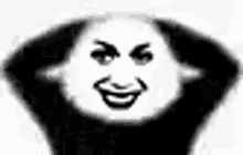 a black and white photo of a person 's face with a funny face .