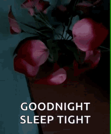 a bouquet of pink flowers in a vase with the words goodnight sleep tight below it