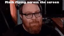 a man with glasses and a beard has the words math flying across the screen above his head