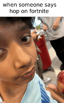 a boy holding an apple with a caption that says ' when someone says hop on fortnite ' on it