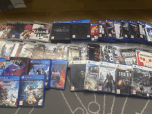 a collection of ps4 games including spider man