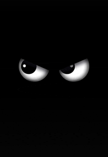 a pair of cartoon eyes with a black background