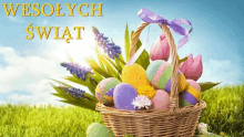 a wicker basket filled with easter eggs and flowers says wesolych swiat