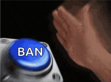 a person is pressing a blue button that says ban