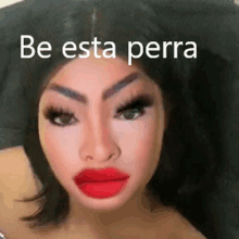 a woman with red lips and false eyelashes is making a funny face with a caption that says `` be esta perra '' .