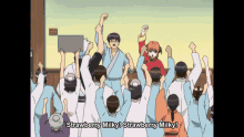 a group of people with their arms in the air and the words strawberry milky