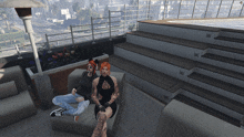 a screenshot of a video game shows a man and a woman sitting on a couch