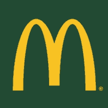 a green background with a yellow mcdonald 's logo on it