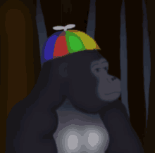 a gorilla is wearing a colorful hat with a propeller on top