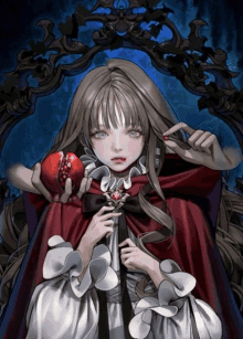 a girl in a red cape is holding an apple