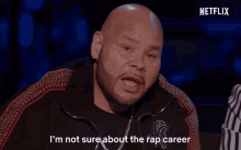 a bald man with a beard says i 'm not sure about the rap career