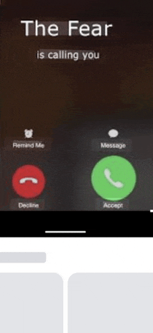 a phone screen that says " the fear is calling you " on it