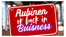 a sign that says rubinen er back in business