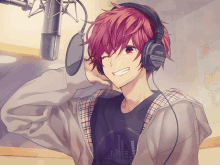 a boy with red hair is wearing headphones that say vox