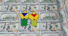 a stack of 100 dollar bills with two roblox characters in front of them