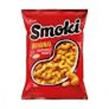 a bag of smoki macaroni and cheese is sitting on a white surface .