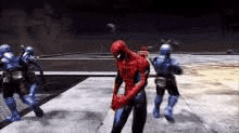 a group of soldiers are standing around a spider-man in a video game .