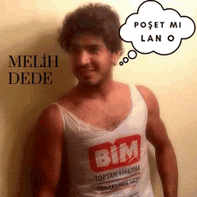 a man wearing a tank top that says bim