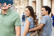 a man and woman are walking down a street with a cartoon character behind them