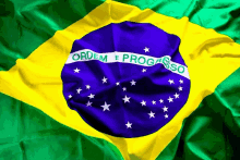 a brazilian flag with ordem e progresso on it