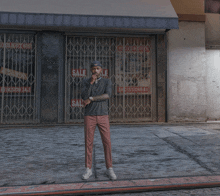 a man stands in front of a store with a sign that says sale on it