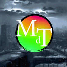 a colorful circle with the letters m and t inside of it