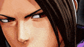 a close up of a person 's face with red eyes and long hair