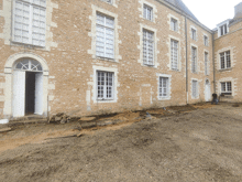 a building with a lot of windows and a door