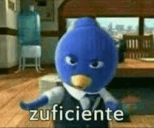 a blue stuffed animal in a suit and tie is standing in a room with the word zuficiente written on it .