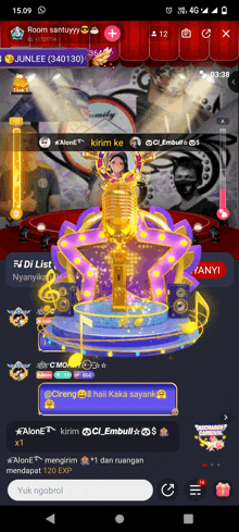 a screenshot of a video game showing a gold microphone on a stage