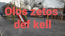 a picture of a playground with the words olosztos def kell written in red