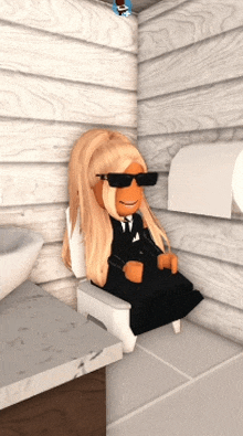 a girl in a black suit and tie is sitting on a toilet