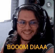 a man wearing headphones and glasses is smiling and saying `` booom diaaa '' .