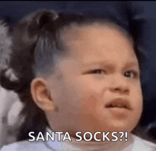 a little girl is crying and saying santa socks !