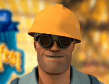 a man wearing a yellow hard hat and goggles smiles