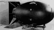 a black and white photo of a large bomb with the letter a on the side