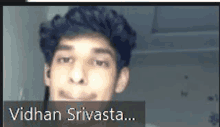 a picture of a young man with the name vidhan srivastava on it