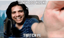 a man wearing headphones takes a selfie with a caption that says twitch pe