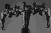 a black and white photo of a statue of a muscular man with many arms .