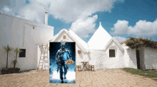 a poster of a soldier holding a pizza in front of a white building